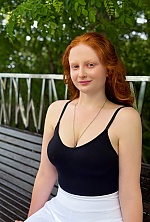 Ukrainian mail order bride Oleksandra from Cherkasy with auburn hair and blue eye color - image 2