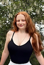Ukrainian mail order bride Oleksandra from Cherkasy with auburn hair and blue eye color - image 2