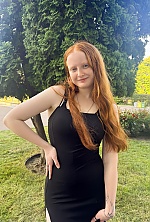 Ukrainian mail order bride Oleksandra from Cherkasy with auburn hair and blue eye color - image 14