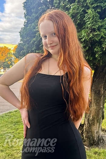 Ukrainian mail order bride Oleksandra from Cherkasy with auburn hair and blue eye color - image 1