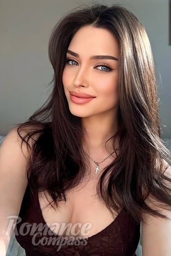 Ukrainian mail order bride Alina from Lviv with brunette hair and blue eye color - image 1