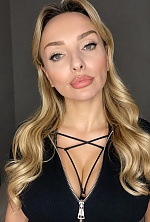 Ukrainian mail order bride Oksana from Kyiv with blonde hair and green eye color - image 6