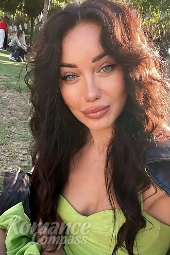 Ukrainian mail order bride Anna from Marbella with brunette hair and blue eye color - image 1