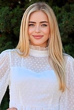 Ukrainian mail order bride Valeriia from Lyon with blonde hair and blue eye color - image 3