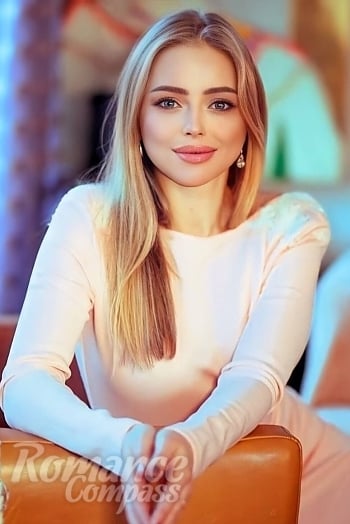 Ukrainian mail order bride Valeriia from Lyon with blonde hair and blue eye color - image 1