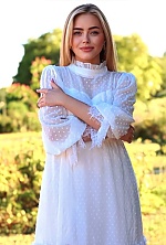 Ukrainian mail order bride Valeriia from Lyon with blonde hair and blue eye color - image 7
