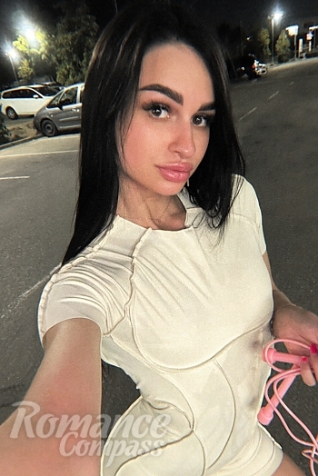 Ukrainian mail order bride Albina from Olomouc with black hair and black eye color - image 1