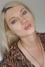 Ukrainian mail order bride Natalia from Kyiv with blonde hair and grey eye color - image 20