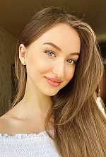 Ukrainian mail order bride Nadiya from Kryvyi Rih with light brown hair and blue eye color - image 6