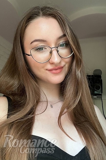 Ukrainian mail order bride Nadiya from Kryvyi Rih with light brown hair and blue eye color - image 1