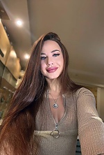 Ukrainian mail order bride Yuliia from Rozdilna with light brown hair and green eye color - image 9