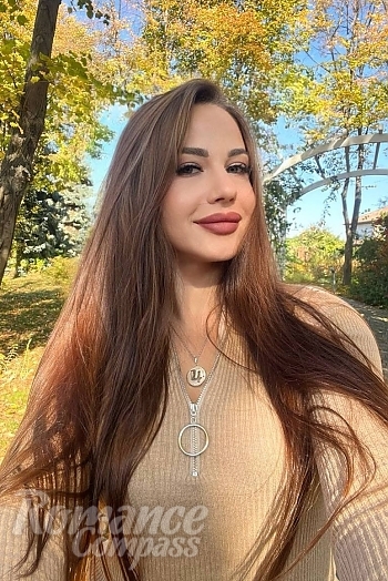 Ukrainian mail order bride Yuliia from Rozdilna with light brown hair and green eye color - image 1