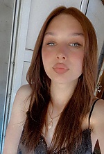 Ukrainian mail order bride Oleksandra from Mykolayiv with light brown hair and green eye color - image 11