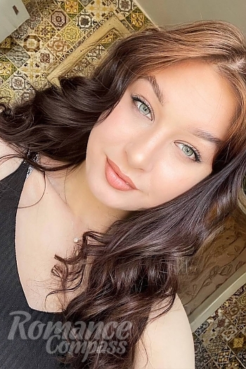 Ukrainian mail order bride Oleksandra from Mykolayiv with light brown hair and green eye color - image 1