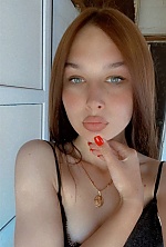 Ukrainian mail order bride Oleksandra from Mykolayiv with light brown hair and green eye color - image 10