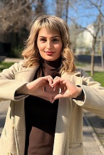 Ukrainian mail order bride Lyudmila from Mykolayiv with blonde hair and green eye color - image 12
