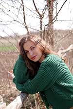 Ukrainian mail order bride Ruslana from Khmelnytskyi with light brown hair and hazel eye color - image 10