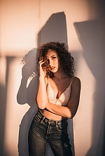 Ukrainian mail order bride Ruslana from Khmelnytskyi with light brown hair and hazel eye color - image 12