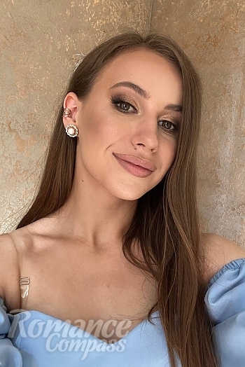 Ukrainian mail order bride Ruslana from Khmelnytskyi with light brown hair and hazel eye color - image 1