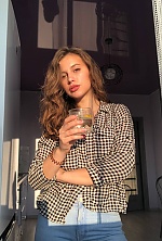 Ukrainian mail order bride Ruslana from Khmelnytskyi with light brown hair and hazel eye color - image 5
