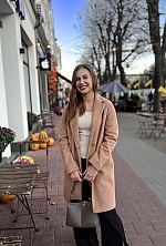 Ukrainian mail order bride Ruslana from Khmelnytskyi with light brown hair and hazel eye color - image 11