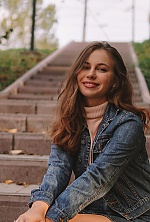 Ukrainian mail order bride Ruslana from Khmelnytskyi with light brown hair and hazel eye color - image 7
