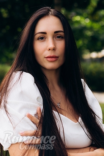 Ukrainian mail order bride Anna from Kyiv with black hair and brown eye color - image 1