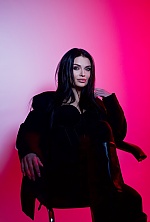 Ukrainian mail order bride Anastasiia from Kyiv with black hair and green eye color - image 8