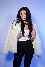 Ukrainian mail order bride Anastasiia from Kyiv with black hair and green eye color - image 3