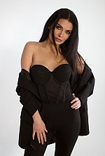 Ukrainian mail order bride Anastasiia from Kyiv with black hair and green eye color - image 6