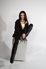 Ukrainian mail order bride Anastasiia from Kyiv with black hair and green eye color - image 5