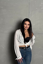 Ukrainian mail order bride Anastasiia from Kyiv with black hair and green eye color - image 9