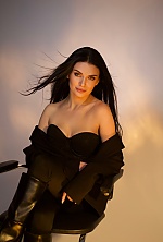 Ukrainian mail order bride Anastasiia from Kyiv with black hair and green eye color - image 7