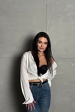 Ukrainian mail order bride Anastasiia from Kyiv with black hair and green eye color - image 10