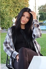 Ukrainian mail order bride Anastasiia from Kyiv with black hair and green eye color - image 11