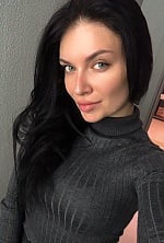 Ukrainian mail order bride Anastasiia from Kyiv with black hair and green eye color - image 12