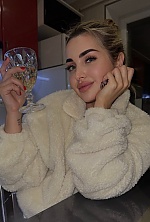 Ukrainian mail order bride Alina from Mykolayiv with blonde hair and green eye color - image 11