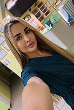 Ukrainian mail order bride Alina from Mykolayiv with blonde hair and green eye color - image 7