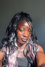 Ukrainian mail order bride Sadiye from Abuja with black hair and brown eye color - image 8