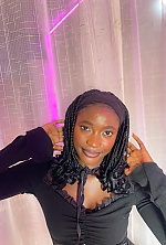 Ukrainian mail order bride Sadiye from Abuja with black hair and brown eye color - image 12