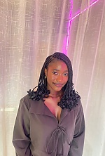 Ukrainian mail order bride Sadiye from Abuja with black hair and brown eye color - image 14