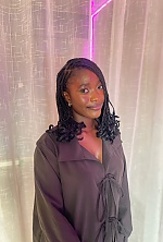Ukrainian mail order bride Sadiye from Abuja with black hair and brown eye color - image 13