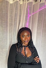 Ukrainian mail order bride Sadiye from Abuja with black hair and brown eye color - image 11
