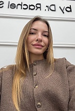 Ukrainian mail order bride Anastasia from Herzliya with light brown hair and green eye color - image 5