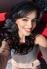 Ukrainian mail order bride Bohdana from Sumy with black hair and brown eye color - image 4