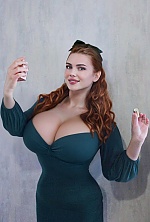 Ukrainian mail order bride Oksana from Kyiv with red hair and green eye color - image 4
