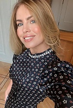 Ukrainian mail order bride Valentina from Kyiv with light brown hair and grey eye color - image 8