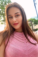 Ukrainian mail order bride Veronika from Lviv with brunette hair and green eye color - image 5