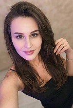 Ukrainian mail order bride Veronika from Lviv with brunette hair and green eye color - image 8