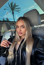 Ukrainian mail order bride Iryna from Kyiv with blonde hair and green eye color - image 9